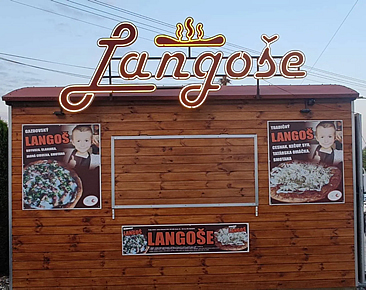 Neonové světelné logo na plastovém podkladu